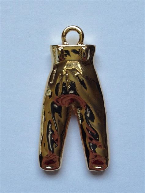 replica gold pants charm